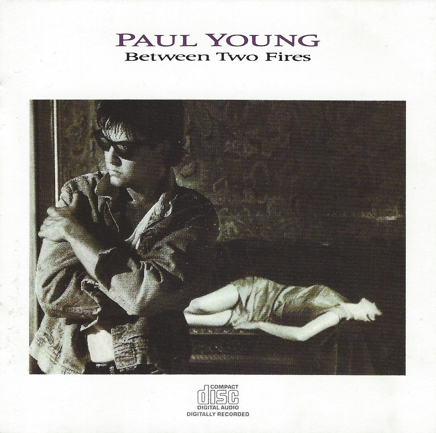 Paul Young - Between Two Fires - Used Cassette